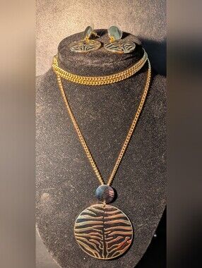 Gold-Tone Layered Zebra Pendant Necklace And Matching Earrings